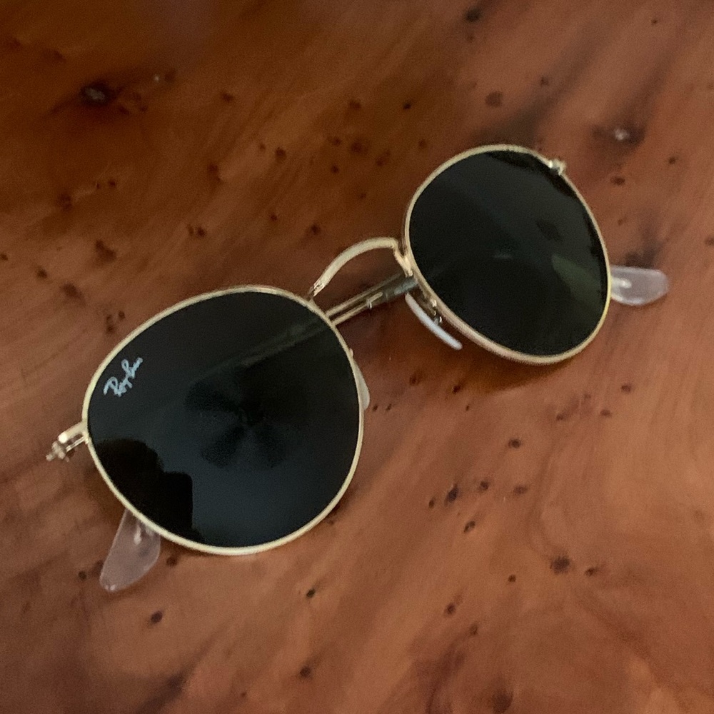 Women’s gold Ray-Ban sunglasses